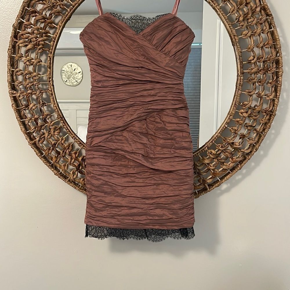 What a great dress to wear to a wedding.  Strapless BCBG shimmer rose with lace
